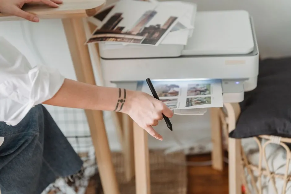 Sheets of paper coming out of a home printer